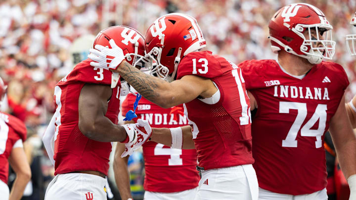 Indiana Hoosiers wide receiver Omar Cooper Jr. celebrates his touchdown with teammates in the first quarter against the Michigan Wolverines  at Memorial Stadium.