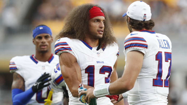 Aug 17, 2024; Pittsburgh, Pennsylvania, USA;  Buffalo Bills wide receiver Mack Hollins (13) and quarterback Josh Allen (17) talk on the field against the Pittsburgh Steelers during the second quarter at Acrisure Stadium. Mandatory Credit: Charles LeClaire-Imagn Images