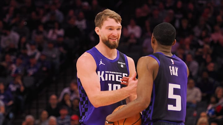 Feb 9, 2024; Sacramento, California, USA; Sacramento Kings center Domantas Sabonis (10) smiles with guard De'Aaron Fox (5) after a play against the Denver Nuggets during the second quarter at Golden 1 Center. Mandatory Credit: Kelley L Cox-Imagn Images Feb 9, 2024; Sacramento, California, USA; Sacramento Kings center Domantas Sabonis (10) smiles with guard De'Aaron Fox (5) after a play against the Denver Nuggets during the second quarter at Golden 1 Center. Mandatory Credit: Kelley L Cox-Imagn Images