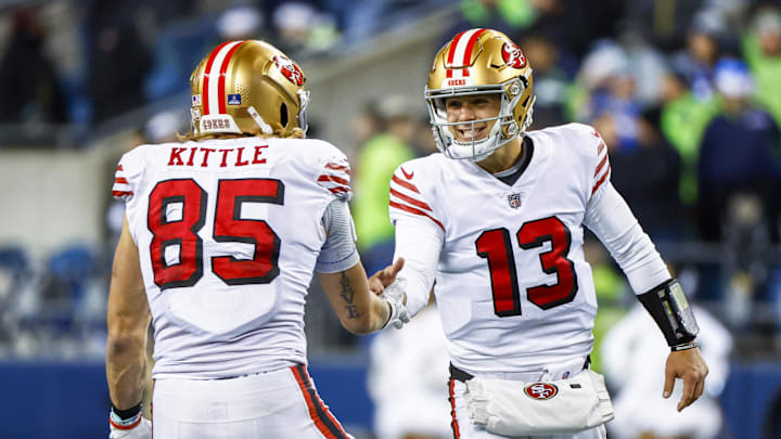 Dec 15, 2022; Seattle, Washington, USA; San Francisco 49ers quarterback Brock Purdy (13) celebrates with tight end George Kittle (85) during the late fourth quarter against the Seattle Seahawks at Lumen Field. Mandatory Credit: Joe Nicholson-Imagn Images Dec 15, 2022; Seattle, Washington, USA; San Francisco 49ers quarterback Brock Purdy (13) celebrates with tight end George Kittle (85) during the late fourth quarter against the Seattle Seahawks at Lumen Field. Mandatory Credit: Joe Nicholson-Imagn Images