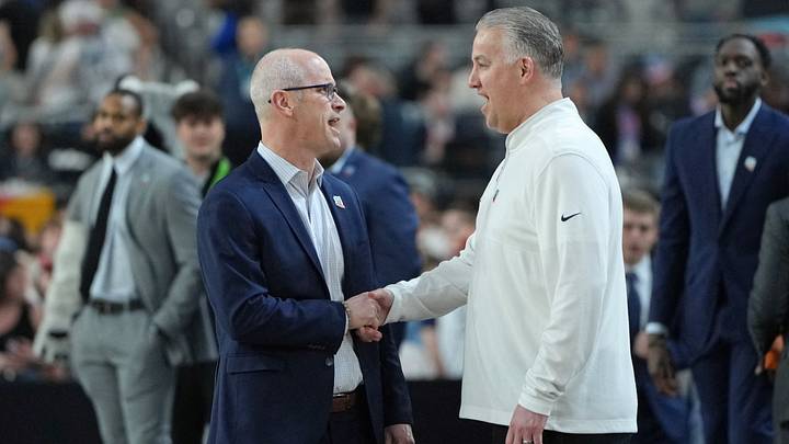 Connecticut Huskies head coach Dan Hurley shakes hands with Purdue Boilermakers head coach Matt Painter. Connecticut Huskies head coach Dan Hurley shakes hands with Purdue Boilermakers head coach Matt Painter.