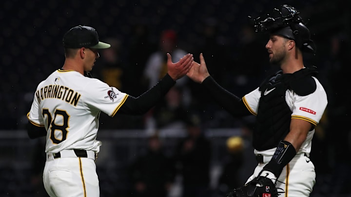 Apr 7, 2025; Pittsburgh, Pennsylvania, USA;  Pittsburgh Pirates relief pitcher Thomas Harrington (78) and catcher Joey Bart (14) celebrate after defeating the St. Louis Cardinals at PNC Park. Mandatory Credit: Charles LeClaire-Imagn Images
