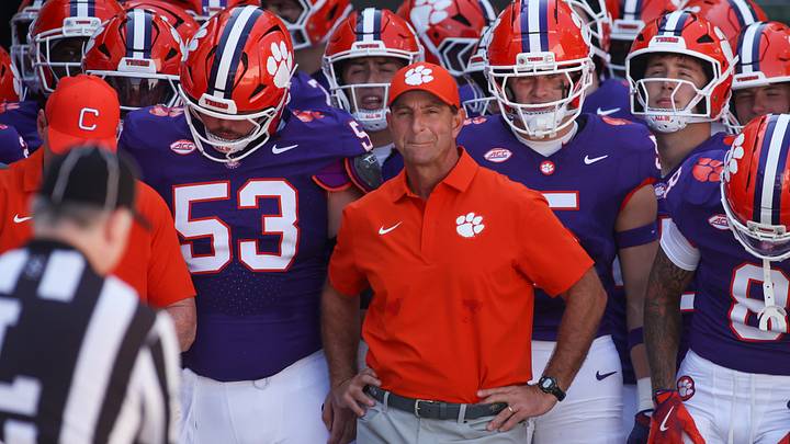 Sep 13, 2025; Atlanta, Georgia, USA; Clemson Tigers head coach Dabo Swinney prepares to run on the field with his team before a game against the Georgia Tech Yellow Jackets at Bobby Dodd Stadium at Hyundai Field. Mandatory Credit: Brett Davis-Imagn Images