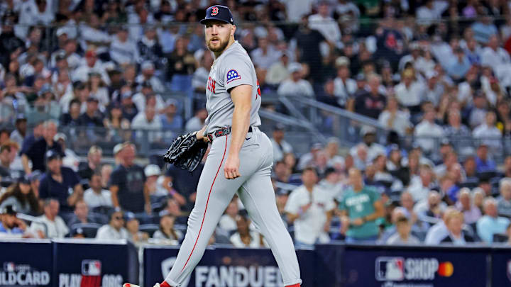 Sep 30, 2025; Bronx, New York, USA; Boston Red Sox pitcher Garrett Crochet (35) looks back at first base after getting New York Yankees third base Amed Rosario (14) to ground out during the seventh inning during game one of the Wildcard round for the 2025 MLB playoffs at Yankee Stadium. Mandatory Credit: Brad Penner-Imagn Images Sep 30, 2025; Bronx, New York, USA; Boston Red Sox pitcher Garrett Crochet (35) looks back at first base after getting New York Yankees third base Amed Rosario (14) to ground out during the seventh inning during game one of the Wildcard round for the 2025 MLB playoffs at Yankee Stadium. Mandatory Credit: Brad Penner-Imagn Images
