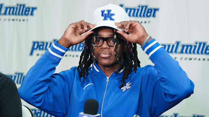 Jasper Johnson, a Lexington native and one of the top basketball players in the 2025 high school class, announces his commitment to the University of Kentucky during a ceremony at the Woodford County High School in Versailles, Ky. on Sep. 5, 2024.