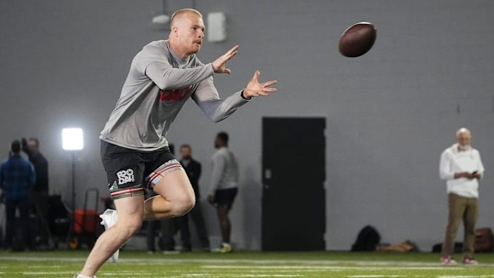 Mar 20, 2024; Columbus, Ohio, USA; Ohio State Buckeyes linebacker Tommy Eichenberg catches a ball during Pro Day at the Woody Hayes Athletic Center.