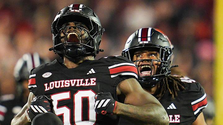 Louisville Cardinals defensive lineman Clev Lubin (50) celebrates Louisville Cardinals defensive lineman Clev Lubin (50) celebrates