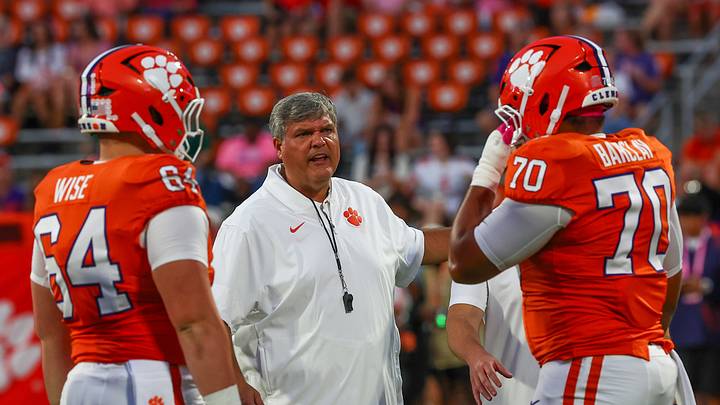 Oct 3, 2026; Clemson, South Carolina, USA; Clemson Tigers offensive line coach Matt Luke talks with offensive lineman Grant Wise (64) and Chance Barclay (70) before the game against the Miami Hurricanes at Memorial Stadium. Mandatory Credit: Ashley Tumlin-Imagn Images Oct 3, 2026; Clemson, South Carolina, USA; Clemson Tigers offensive line coach Matt Luke talks with offensive lineman Grant Wise (64) and Chance Barclay (70) before the game against the Miami Hurricanes at Memorial Stadium. Mandatory Credit: Ashley Tumlin-Imagn Images