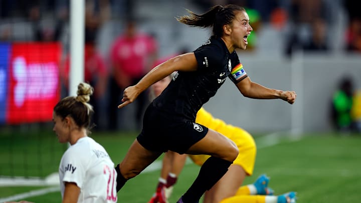 Angel City FC's Ali Riley celebrates in a match against San Diego Wave FC
