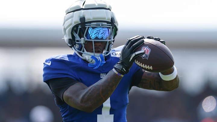 Aug 4, 2025; East Rutherford, NJ, USA; New York Giants wide receiver Malik Nabers (1) makes a catch during training camp at Quest Diagnostics Training Center. Mandatory Credit: Vincent Carchietta-Imagn Images