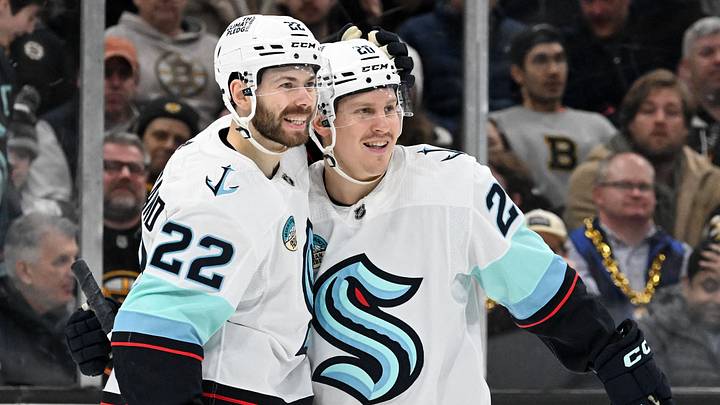 Feb 15, 2024; Boston, Massachusetts, USA; Seattle Kraken right wing Eeli Tolvanen (20) celebrates with right wing Oliver Bjorkstrand (22) after scoring a goal against the Boston Bruins during the second period at the TD Garden. Mandatory Credit: Brian Fluharty-USA TODAY Sports