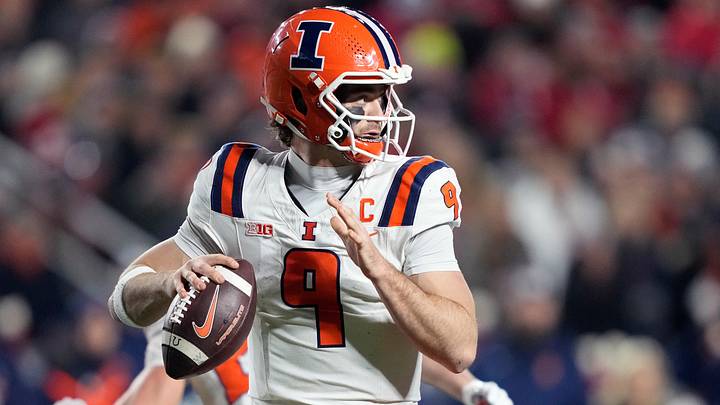 Nov 22, 2025; Madison, Wisconsin, USA; Illinois Fighting Illini quarterback Luke Altmyer (9) throws the ball against the Wisconsin Badgers during the second quarter at Camp Randall Stadium. Mandatory Credit: Kayla Wolf-Imagn Images
