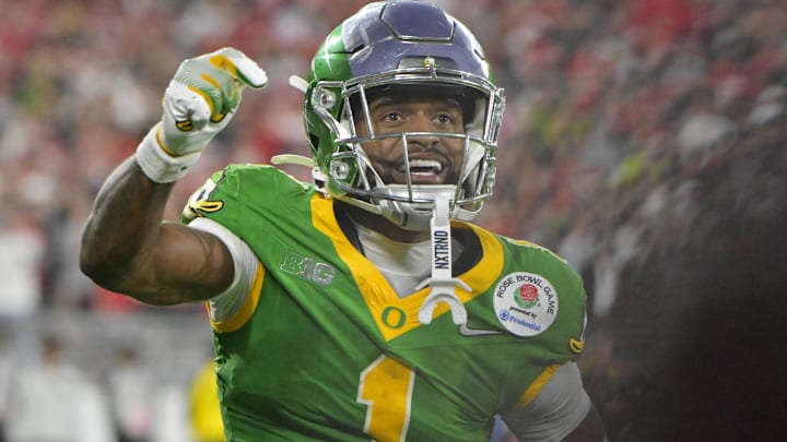Oregon Ducks wide receiver Traeshon Holden celebrates after a touchdown in the second half against the Ohio State Buckeyes in the 2025 Rose Bowl. Oregon Ducks wide receiver Traeshon Holden celebrates after a touchdown in the second half against the Ohio State Buckeyes in the 2025 Rose Bowl.