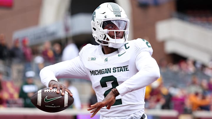 Nov 1, 2025; Minneapolis, Minnesota, USA; Michigan State Spartans quarterback Aidan Chiles (2) warms up before the game against the Minnesota Golden Gophers at Huntington Bank Stadium. Mandatory Credit: Matt Krohn-Imagn Images