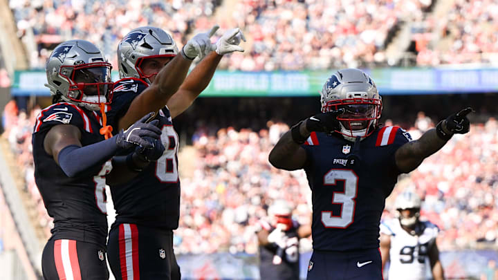 Sep 28, 2025; Foxborough, Massachusetts, USA; New England Patriots wide receiver Stefon Diggs (8), tight end Hunter Henry (85), and wide receiver Demario Douglas (3) react after a play against the Carolina Panthers during the second half at Gillette Stadium. Mandatory Credit: Brian Fluharty-Imagn Images Sep 28, 2025; Foxborough, Massachusetts, USA; New England Patriots wide receiver Stefon Diggs (8), tight end Hunter Henry (85), and wide receiver Demario Douglas (3) react after a play against the Carolina Panthers during the second half at Gillette Stadium. Mandatory Credit: Brian Fluharty-Imagn Images
