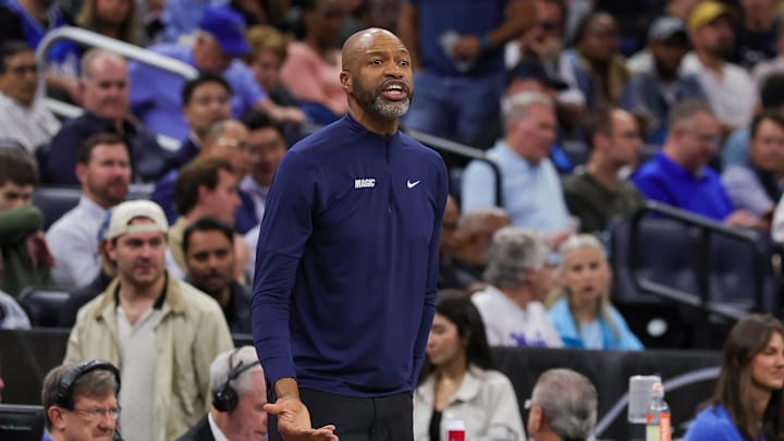 Orlando Magic head coach Jamahl Mosley motions to the court during the first quarter against the Charlotte Hornets at Kia Center.