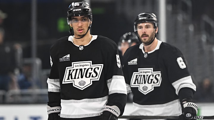 Mar 22, 2025; Los Angeles, California, USA; Los Angeles Kings right wing Quinton Byfield (55) and defenseman Joel Edmundson (6) on the ice against the Carolina Hurricanes during the third period at Crypto.com Arena. Mandatory Credit: Jonathan Hui-Imagn Images