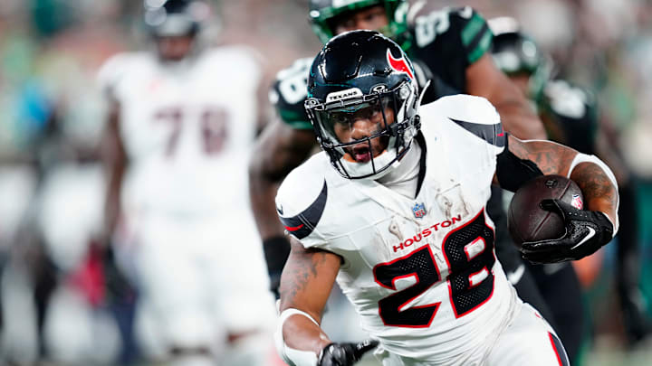 Houston Texans running back Joe Mixon (28) is shown with the ball during the first quarter, Thursday, October 31, 2024, in East Rutherford.
