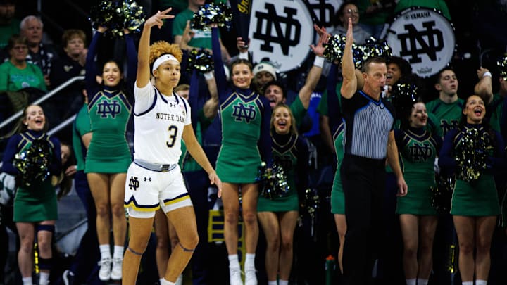 Notre Dame guard Hannah Hidalgo (3) celebrates soaring a three point shot against Texas during a NCAA women's basketball game at Purcell Pavilion on Thursday, Dec. 5, 2024, in South Bend. Notre Dame guard Hannah Hidalgo (3) celebrates soaring a three point shot against Texas during a NCAA women's basketball game at Purcell Pavilion on Thursday, Dec. 5, 2024, in South Bend.