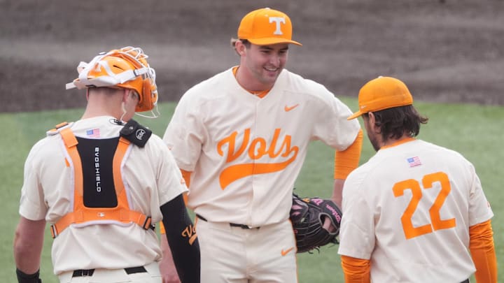 Tennessee pitcher Austin Breedlove is approached by Tony Vitello and Stone Lawless during an NCAA college baseball game against St. Bonaventure on Sunday, March 9, 2025, in Knoxville, Tenn. Tennessee pitcher Austin Breedlove is approached by Tony Vitello and Stone Lawless during an NCAA college baseball game against St. Bonaventure on Sunday, March 9, 2025, in Knoxville, Tenn.