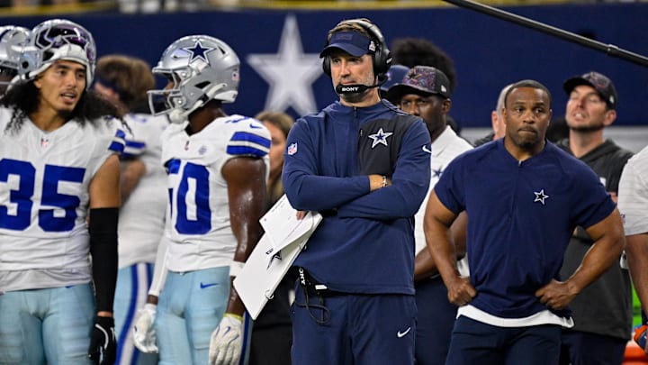 Sep 28, 2025; Arlington, Texas, USA; Dallas Cowboys head coach Brian Schottenheimer looks on from the sidelines during the game between the Dallas Cowboys and the Green Bay Packers at AT&T Stadium. Mandatory Credit: Jerome Miron-Imagn Images