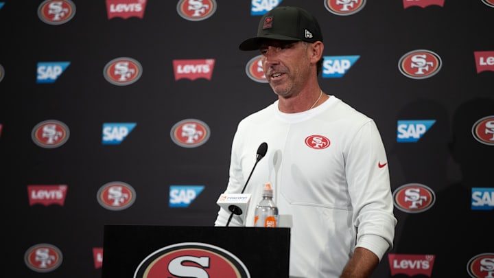 Jul 23, 2025; Santa Clara, CA, USA; San Francisco 49ers head coach Kyle Shanahan answers questions from reporters following the first day of training camp at SAP Performance Facility. Mandatory Credit: D. Ross Cameron-Imagn Images Jul 23, 2025; Santa Clara, CA, USA; San Francisco 49ers head coach Kyle Shanahan answers questions from reporters following the first day of training camp at SAP Performance Facility. Mandatory Credit: D. Ross Cameron-Imagn Images