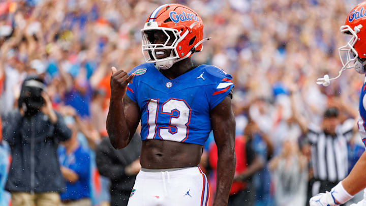 Oct 4, 2025; Gainesville, Florida, USA; Florida Gators running back Jadan Baugh (13) gestures after scoring a touchdown against the Texas Longhorns during the first half at Ben Hill Griffin Stadium. Mandatory Credit: Matt Pendleton-Imagn Images