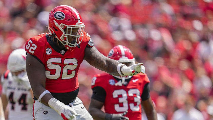 Sep 9, 2023; Athens, Georgia, USA; Georgia Bulldogs defensive lineman Christen Miller (52) reacts after making a tackle against the Ball State Cardinals during the second half at Sanford Stadium. Mandatory Credit: Dale Zanine-Imagn Images Sep 9, 2023; Athens, Georgia, USA; Georgia Bulldogs defensive lineman Christen Miller (52) reacts after making a tackle against the Ball State Cardinals during the second half at Sanford Stadium. Mandatory Credit: Dale Zanine-Imagn Images