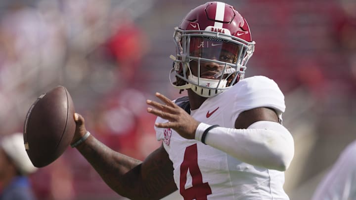 Sep 14, 2024; Madison, Wisconsin, USA;  Alabama Crimson Tide quarterback Jalen Milroe (4) throws a pass during warmups prior to the game against the Wisconsin Badgers at Camp Randall Stadium.