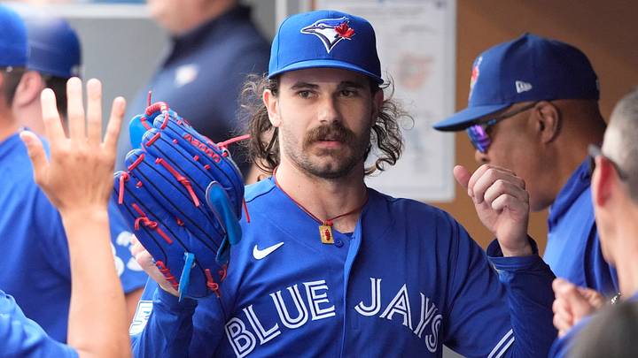 Sep 13, 2026; Toronto, Ontario, CAN;  Toronto Blue Jays starting pitcher Dylan Cease (84) gets congratulated after the first inning against the Baltimore Orioles at Rogers Centre.  Mandatory Credit: John E. Sokolowski-Imagn Images