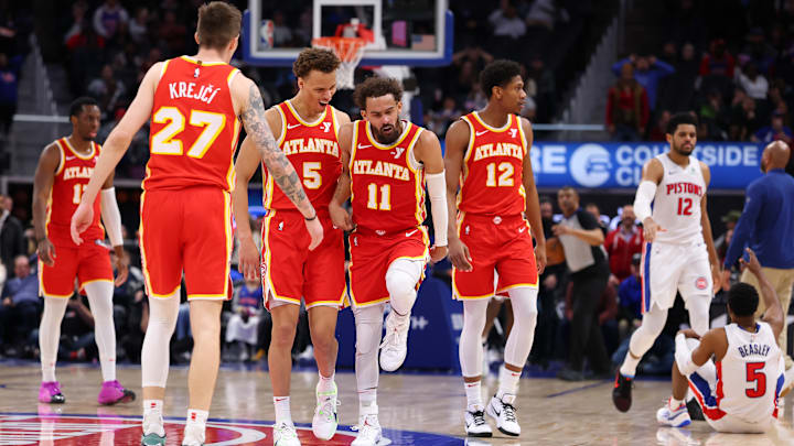 Trae Young #11 of the Atlanta Hawks reacts against the Detroit Pistons.