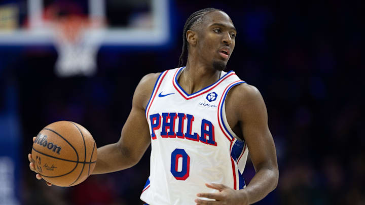 Jan 15, 2025; Philadelphia, Pennsylvania, USA; Philadelphia 76ers guard Tyrese Maxey (0) controls the ball against the New York Knicks during the third quarter at Wells Fargo Center. Mandatory Credit: Bill Streicher-Imagn Images