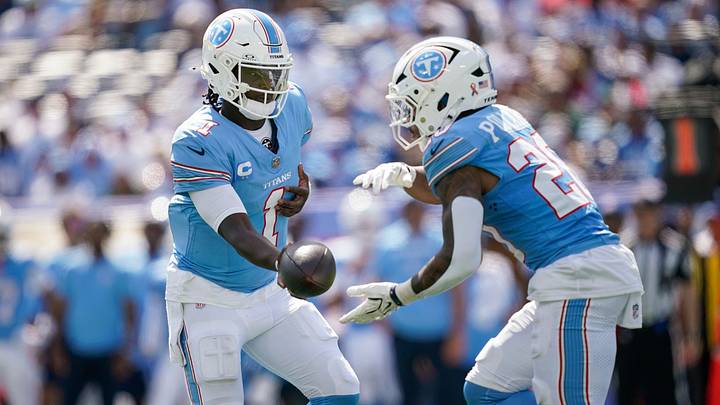 Tennessee Titans quarterback Cam Ward (1) hands off to running back Tony Pollard (20) during the third quarter against the New York Jets at Nissan Stadium in Nashville, Tenn., Sunday, Sept. 13, 2026. Tennessee Titans quarterback Cam Ward (1) hands off to running back Tony Pollard (20) during the third quarter against the New York Jets at Nissan Stadium in Nashville, Tenn., Sunday, Sept. 13, 2026.