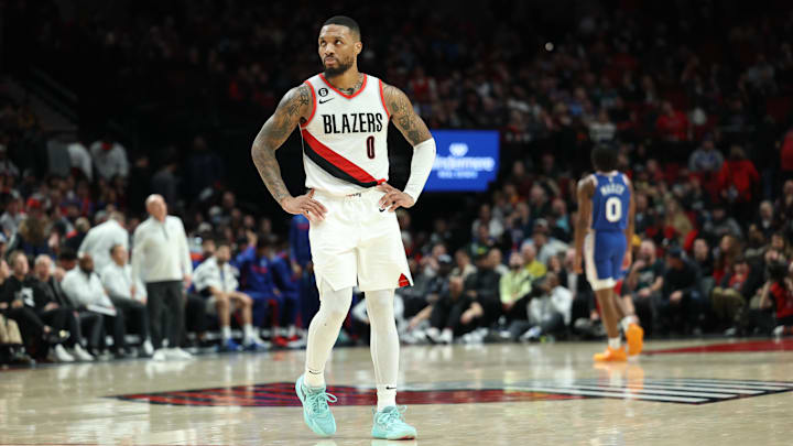 Jan 19, 2023; Portland, Oregon, USA; Portland Trail Blazers guard Damian Lillard (0) reacts while looking at the scoreboard in the closing seconds of the game against the Philadelphia 76ers at Moda Center. Mandatory Credit: Jaime Valdez-Imagn Images Jan 19, 2023; Portland, Oregon, USA; Portland Trail Blazers guard Damian Lillard (0) reacts while looking at the scoreboard in the closing seconds of the game against the Philadelphia 76ers at Moda Center. Mandatory Credit: Jaime Valdez-Imagn Images