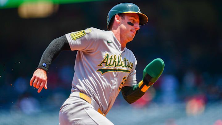 Jun 11, 2025; Anaheim, California, USA; Athletics designated hitter Brent Rooker (25) runs home to score against the Los Angeles Angels during the first inning at Angel Stadium. Mandatory Credit: Gary A. Vasquez-Imagn Images