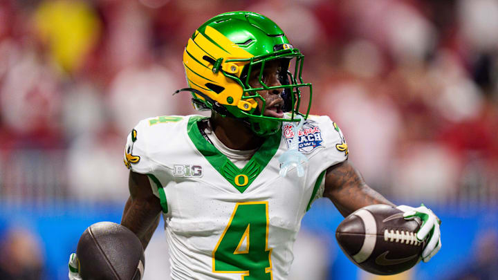 Oregon wide receiver Malik Benson warms up as the Oregon Ducks face the Indiana Hoosiers in the Peach Bowl on Jan. 9, 2026, at Mercedes-Benz Stadium in Atlanta, Georgia.