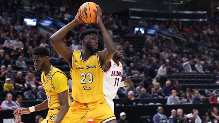 Mar 21, 2024; Salt Lake City, UT, USA;  Long Beach State 49ers guard Lassina Traore (23) grabs the ball againt Arizona Wildcats during the first half in the first round of the 2024 NCAA Tournament at Vivint Smart Home Arena-Delta Center. Mandatory Credit: Rob Gray-Imagn Images