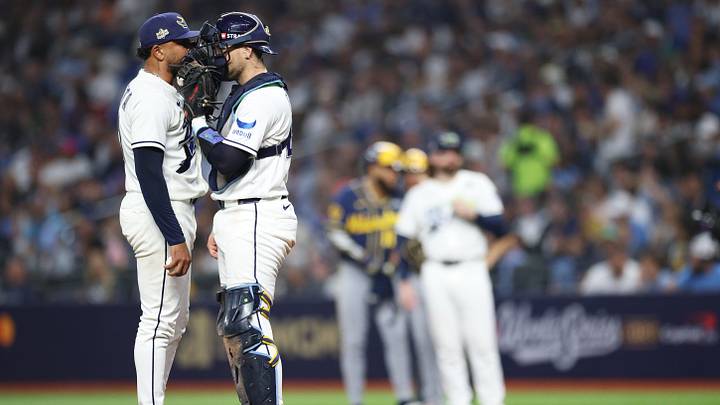 Oct 26, 2026; St. Petersburg, Florida, USA; Tampa Bay Rays pitcher Freddy Peralta (51) and catcher Nick Fortes (40) talk during the fifth inning in game three of the 2026 World Series at Tropicana Field. Mandatory Credit: Nathan Ray Seebeck-Imagn Images Oct 26, 2026; St. Petersburg, Florida, USA; Tampa Bay Rays pitcher Freddy Peralta (51) and catcher Nick Fortes (40) talk during the fifth inning in game three of the 2026 World Series at Tropicana Field. Mandatory Credit: Nathan Ray Seebeck-Imagn Images