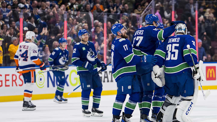Nov 15, 2023; Vancouver, British Columbia, CAN; Vancouver Canucks defenseman Filip Hronek (17) and