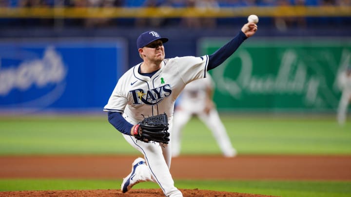 May 21, 2024; St. Petersburg, Florida, USA;  Tampa Bay Rays pitcher Garrett Cleavinger (60) throws a pitch against the Boston Red Sox in the seventh inning at Tropicana Field. Mandatory Credit: Nathan Ray Seebeck-USA TODAY Sports
