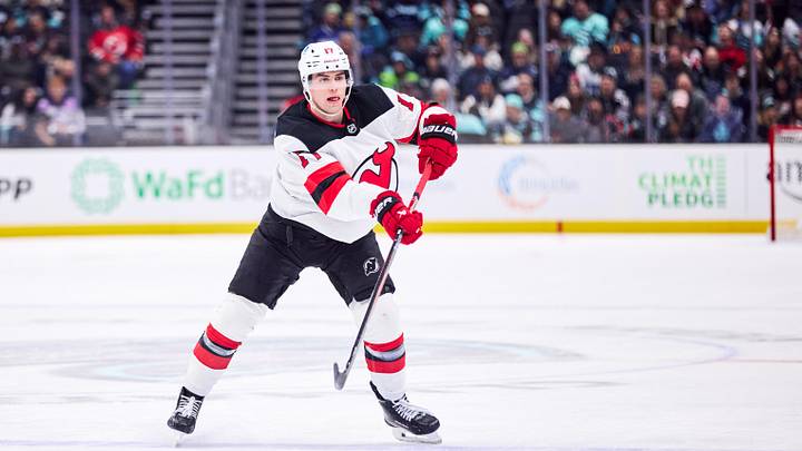 Jan 25, 2026; Seattle, Washington, USA;  New Jersey Devils defenseman Simon Nemec (17) makes a pass during the second period against the Seattle Kraken at Climate Pledge Arena. Mandatory Credit: Blake Dahlin-Imagn Images