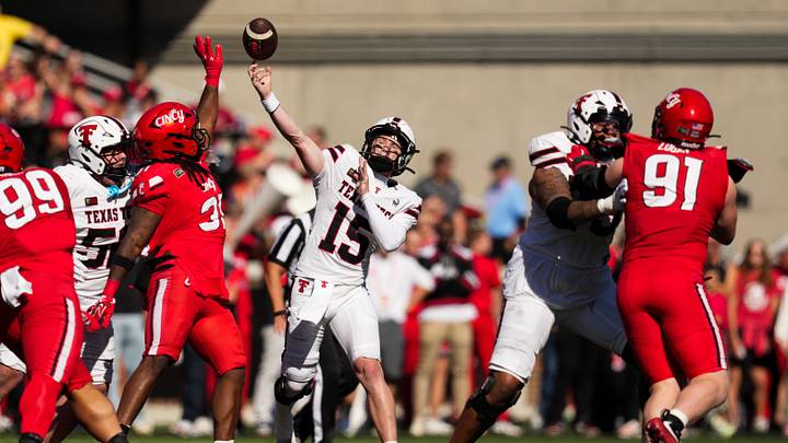 Oct 24, 2026; Cincinnati, Ohio, USA; Texas Tech Red Raiders quarterback Will Hammond (15) throws a pass against the Cincinnati Bearcats in the first half at Nippert Stadium. Mandatory Credit: Aaron Doster-Imagn Images Oct 24, 2026; Cincinnati, Ohio, USA; Texas Tech Red Raiders quarterback Will Hammond (15) throws a pass against the Cincinnati Bearcats in the first half at Nippert Stadium. Mandatory Credit: Aaron Doster-Imagn Images