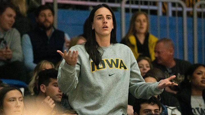 Former Iowa women's basketball player Caitlin Clark reacts after a foul call on Iowa during the Drake vs. Iowa basketball game at Knapp Center on Sunday, Nov. 17, 2024, in Des Moines.