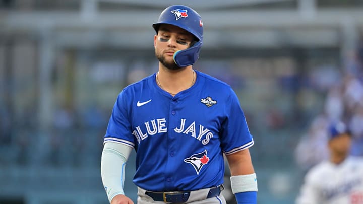 Oct 27, 2025; Los Angeles, California, USA; Toronto Blue Jays second baseman Bo Bichette (11) reacts in the second inning against the Los Angeles Dodgers during game three of the 2025 MLB World Series at Dodger Stadium. Oct 27, 2025; Los Angeles, California, USA; Toronto Blue Jays second baseman Bo Bichette (11) reacts in the second inning against the Los Angeles Dodgers during game three of the 2025 MLB World Series at Dodger Stadium.