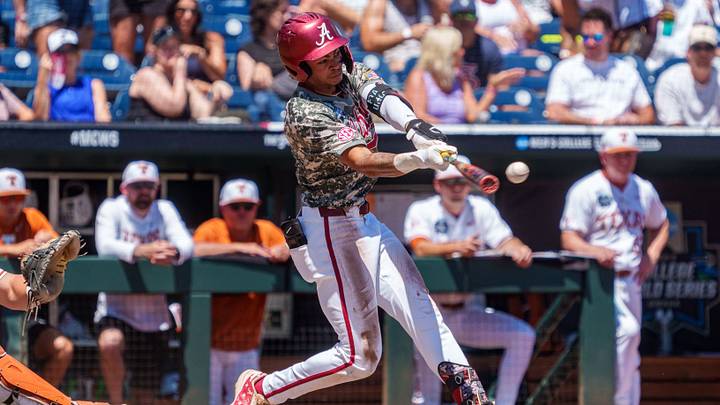 Jun 14, 2026; Omaha, NE, USA; Alabama Crimson Tide shortstop Justin Lebron (1) hits a single against the Texas Longhorns during the third inning at Charles Schwab Field. Mandatory Credit: Dylan Widger-Imagn Images Jun 14, 2026; Omaha, NE, USA; Alabama Crimson Tide shortstop Justin Lebron (1) hits a single against the Texas Longhorns during the third inning at Charles Schwab Field. Mandatory Credit: Dylan Widger-Imagn Images