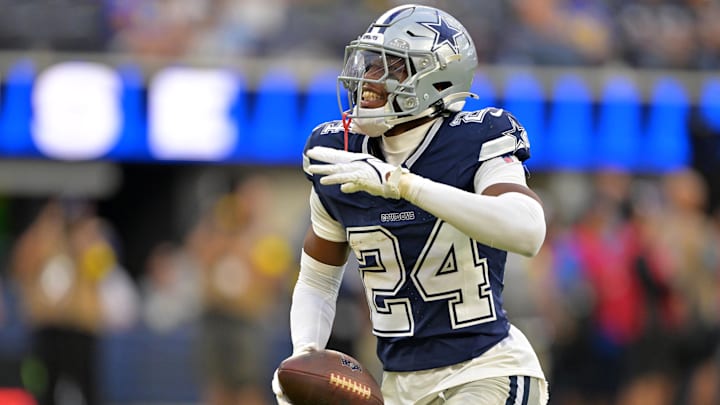 Dallas Cowboys safety Israel Mukuamu celebrates after an interception during the second half against the Los Angeles Rams.
