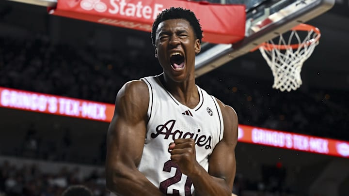 Feb 11, 2025; College Station, Texas, USA; Texas A&M Aggies forward Pharrel Payne (21) reacts after blocking Georgia Bulldogs guard Silas Demary Jr. (not pictured) during the second half at Reed Arena. Mandatory Credit: Maria Lysaker-Imagn Images 