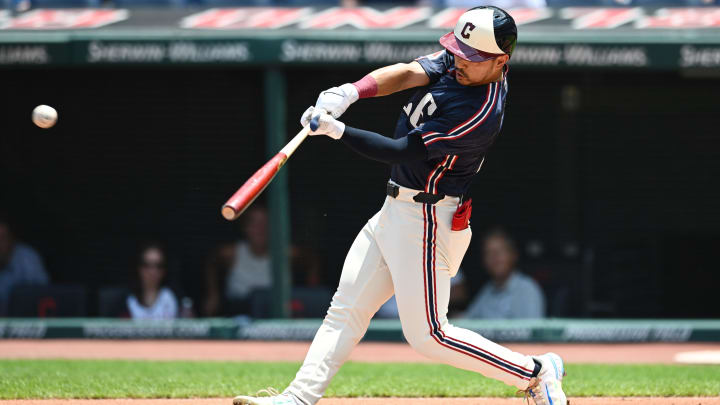 Jun 20, 2024; Cleveland, Ohio, USA; Cleveland Guardians left fielder Steven Kwan (38) hits a double during the first inning against the Seattle Mariners at Progressive Field. Mandatory Credit: Ken Blaze-USA TODAY Sports