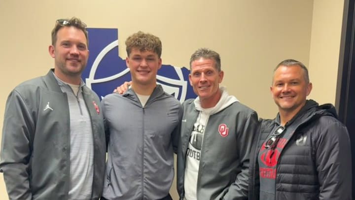 Oklahoma linebackers coach Nate Dreiling, target Cooper Witten, coach Brent Venables, safeties coach Brandon Hall.