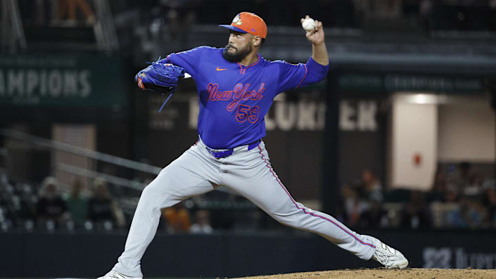 Mar 6, 2026; Jupiter, Florida, USA; New York Mets pitcher Sean Manaea (59) pitches against the Miami Marlins during the first inning at Roger Dean Chevrolet Stadium. Mandatory Credit: Rhona Wise-Imagn Images Mar 6, 2026; Jupiter, Florida, USA; New York Mets pitcher Sean Manaea (59) pitches against the Miami Marlins during the first inning at Roger Dean Chevrolet Stadium. Mandatory Credit: Rhona Wise-Imagn Images